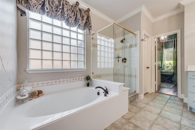2466 Campfire Ln, Frisco, TX 75033 - full bathroom with a garden tub, a stall shower, ornamental molding, and vanity