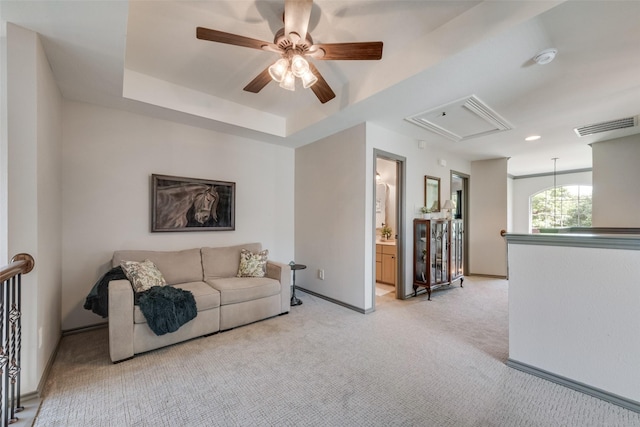 2466 Campfire Ln, Frisco, TX 75033 - living room featuring attic access, light carpet, a ceiling fan, and baseboards
