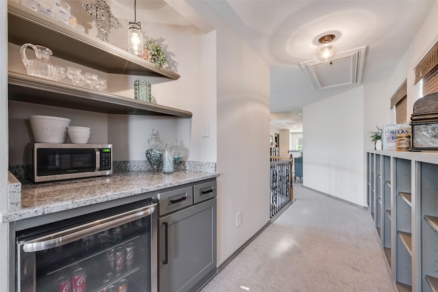 2466 Campfire Ln, Frisco, TX 75033 - indoor dry bar with wine cooler, stainless steel microwave, and light colored carpet