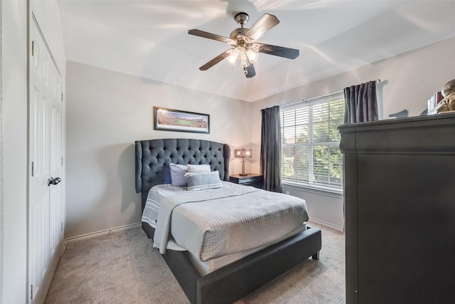 2466 Campfire Ln, Frisco, TX 75033 - carpeted bedroom with baseboards and ceiling fan