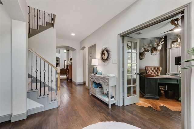 2466 Campfire Ln, Frisco, TX 75033 - foyer entrance with arched walkways, stairway, wood finished floors, recessed lighting, and baseboards
