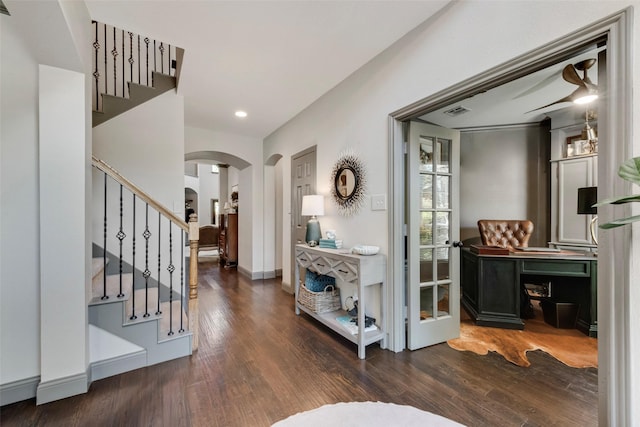 2466 Campfire Ln, Frisco, TX 75033 - entryway featuring arched walkways, stairway, wood finished floors, and recessed lighting