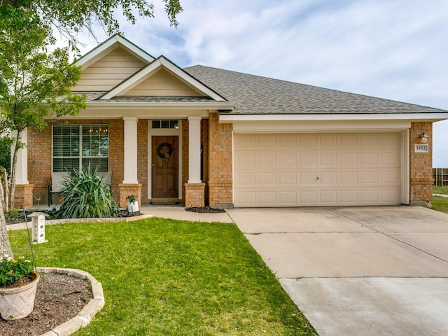 3952 Eaglerun Dr, Fort Worth, TX 76262 - view of front of home with brick siding, concrete driveway, an attached garage, and a front lawn