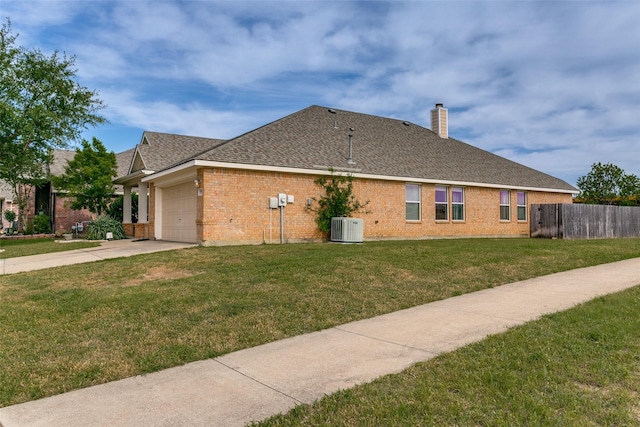 3952 Eaglerun Dr, Fort Worth, TX 76262 - view of property exterior featuring central air condition unit, brick siding, a chimney, concrete driveway, and a garage