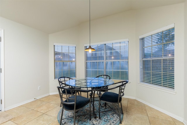 108 Rolling Rock Dr, Trophy Club, TX 76262 - dining room with lofted ceiling, light tile patterned flooring, and baseboards