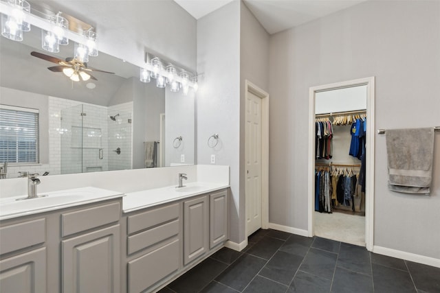 108 Rolling Rock Dr, Trophy Club, TX 76262 - full bathroom with a ceiling fan, a stall shower, double vanity, a walk in closet, and tile patterned flooring