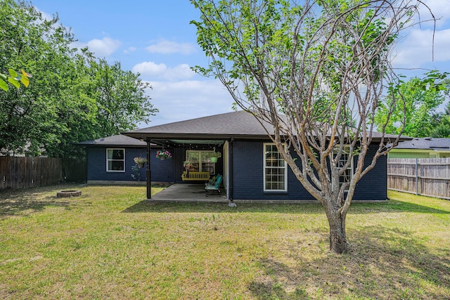 704 Vaughn Dr, Burleson, TX 76028 - back of house featuring an outdoor fire pit, a patio, and brick siding