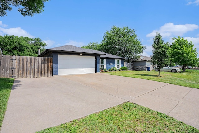 704 Vaughn Dr, Burleson, TX 76028 - ranch-style house featuring a garage, driveway, and brick siding