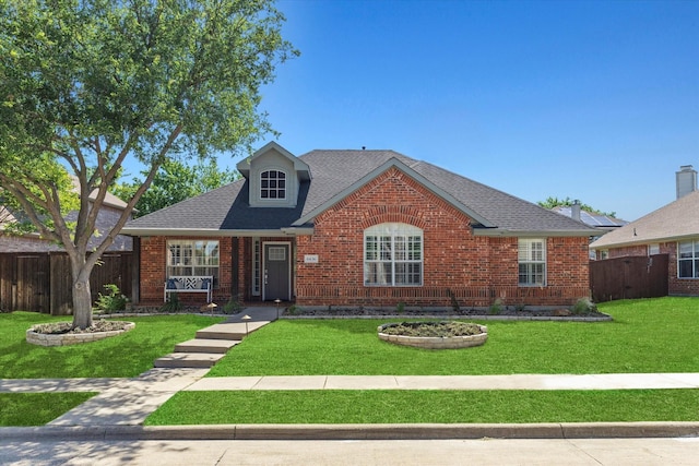 6436 Branchwood Trl, The Colony, TX 75056 - traditional home with brick siding and roof with shingles