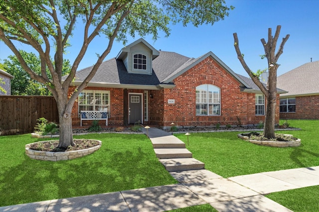 6436 Branchwood Trl, The Colony, TX 75056 - traditional-style home with brick siding and roof with shingles