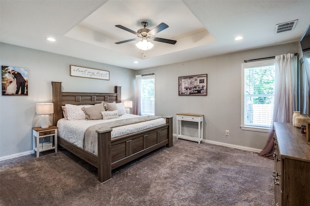 211 Hilltop Cir, Blue Ridge, TX 75424 - bedroom featuring dark carpet, a raised ceiling, baseboards, recessed lighting, and ceiling fan