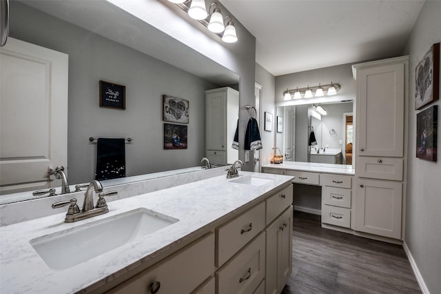211 Hilltop Cir, Blue Ridge, TX 75424 - full bath featuring wood finished floors, double vanity, and baseboards