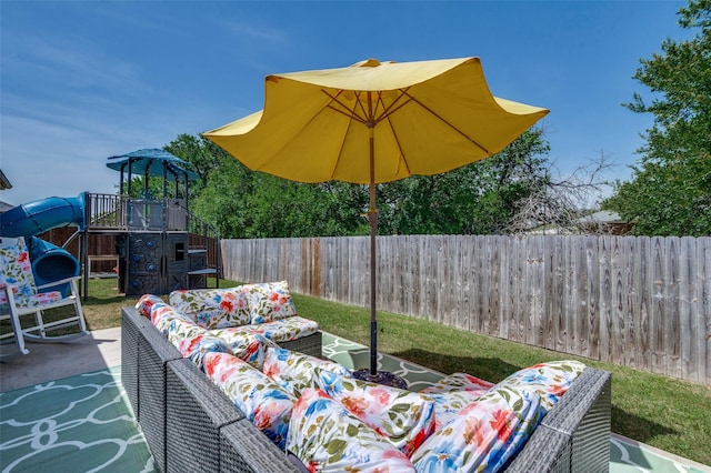 211 Hilltop Cir, Blue Ridge, TX 75424 - view of patio with outdoor lounge area, a playground, and a fenced backyard