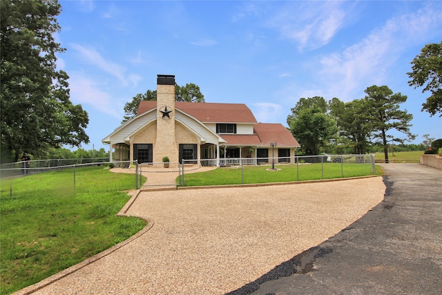 19413 US Highway 79 E, Jacksonville, TX 75766 - rear view of property with a chimney and brick siding