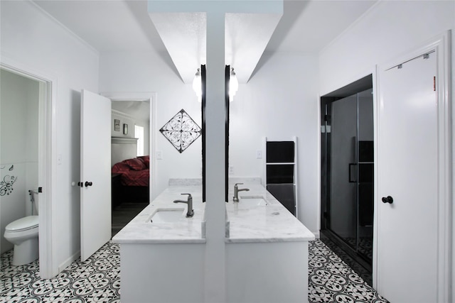 19413 US Highway 79 E, Jacksonville, TX 75766 - bathroom featuring ensuite bathroom, toilet, double vanity, and a stall shower