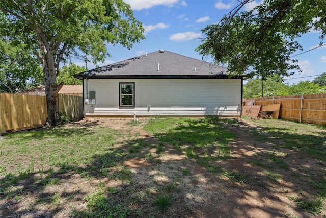 2636 Carter Ave, Fort Worth, TX 76103 - rear view of property with a fenced backyard and a shingled roof