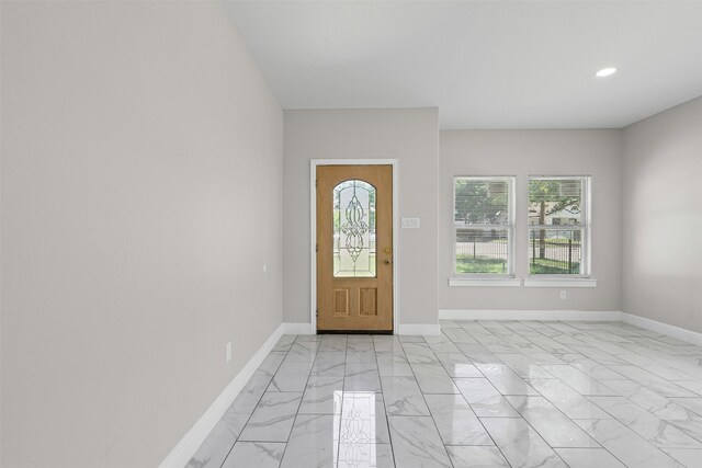2636 Carter Ave, Fort Worth, TX 76103 - entrance foyer with light marble finish flooring, baseboards, and recessed lighting
