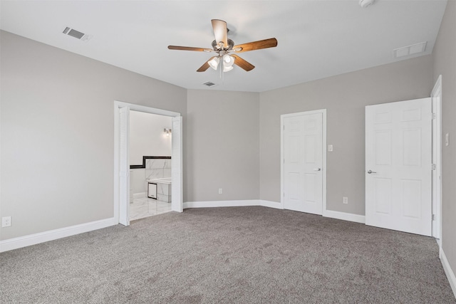 2636 Carter Ave, Fort Worth, TX 76103 - unfurnished bedroom featuring carpet, baseboards, and connected bathroom