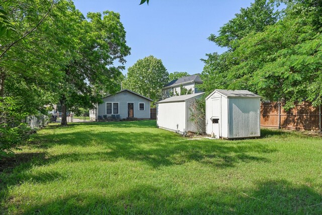 2509 Bird St, Fort Worth, TX 76111 - view of yard with a storage shed and an outbuilding