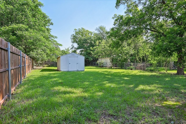 2509 Bird St, Fort Worth, TX 76111 - view of yard with a storage unit and an outdoor structure