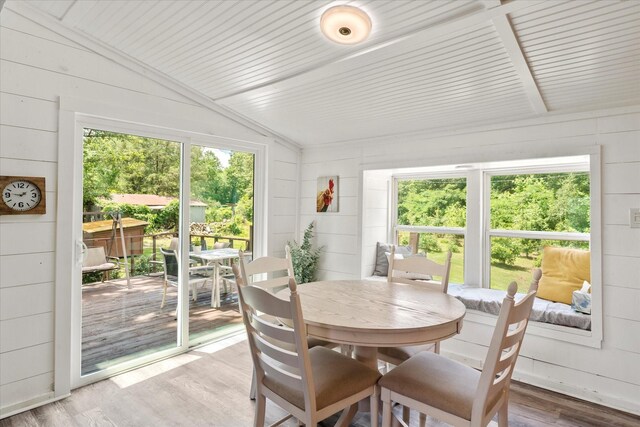 7928 Farm Rd Unit 127, Mount Pleasant, TX 75455 - sunroom featuring lofted ceiling and plenty of natural light