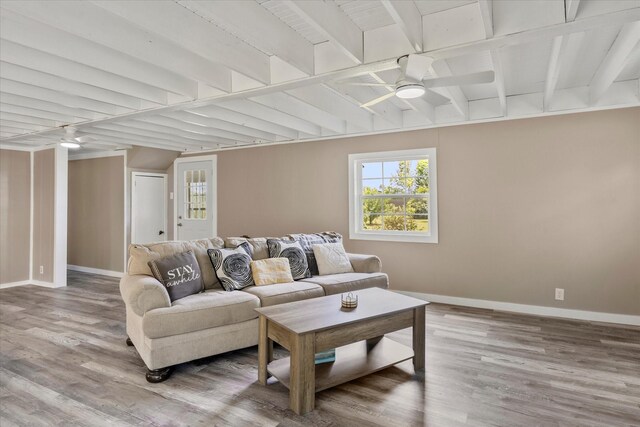 7928 Farm Rd Unit 127, Mount Pleasant, TX 75455 - living room with ceiling fan, baseboards, wood finished floors, and beamed ceiling