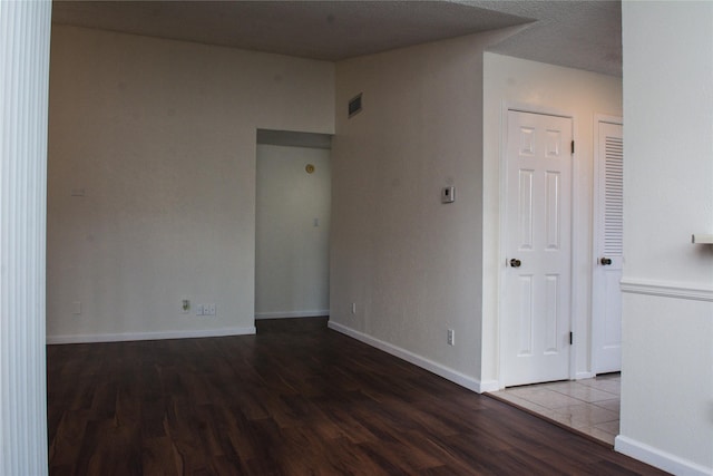1101 Quail Valley Ln Unit 211, Arlington, TX 76011 - unfurnished room featuring wood finished floors and baseboards