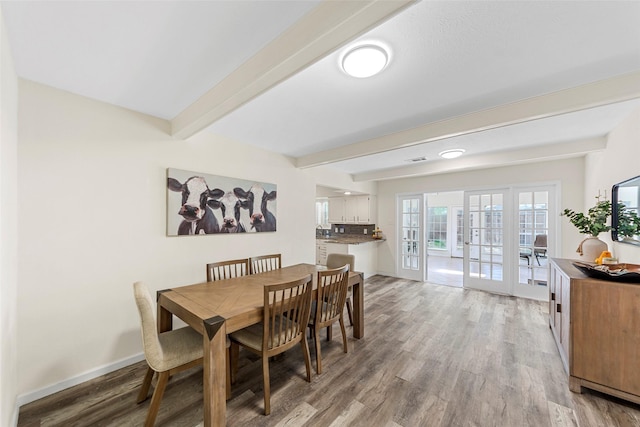 2935 Maydelle Ln, Farmers Branch, TX 75234 - dining room with beam ceiling, light wood-style flooring, baseboards, and french doors