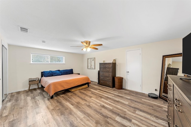 2935 Maydelle Ln, Farmers Branch, TX 75234 - bedroom featuring light wood-style floors and a ceiling fan