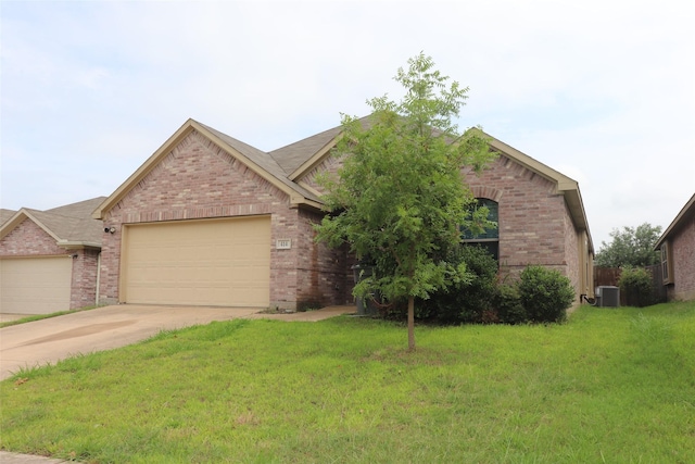414 Stonecreek Dr, Princeton, TX 75407 - view of front of home featuring brick siding, a garage, a front yard, concrete driveway, and central AC unit
