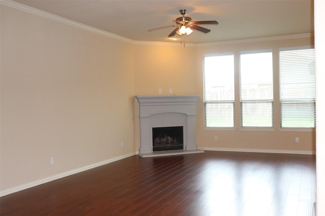 414 Stonecreek Dr, Princeton, TX 75407 - unfurnished living room featuring dark wood finished floors, a fireplace with raised hearth, a ceiling fan, ornamental molding, and baseboards
