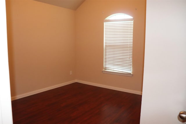 414 Stonecreek Dr, Princeton, TX 75407 - unfurnished room with dark wood-style flooring, baseboards, and vaulted ceiling