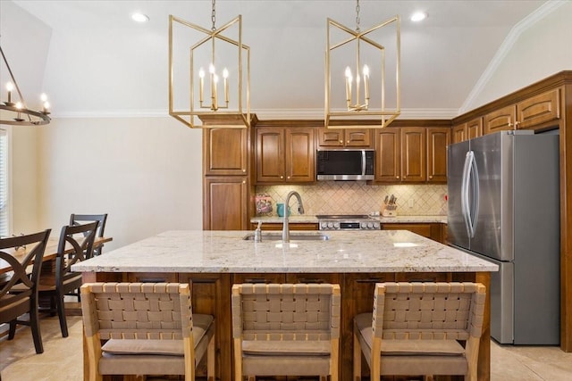 213 Desert Sky Dr, Mcgregor, TX 76657 - kitchen with appliances with stainless steel finishes, a chandelier, a sink, tasteful backsplash, and vaulted ceiling