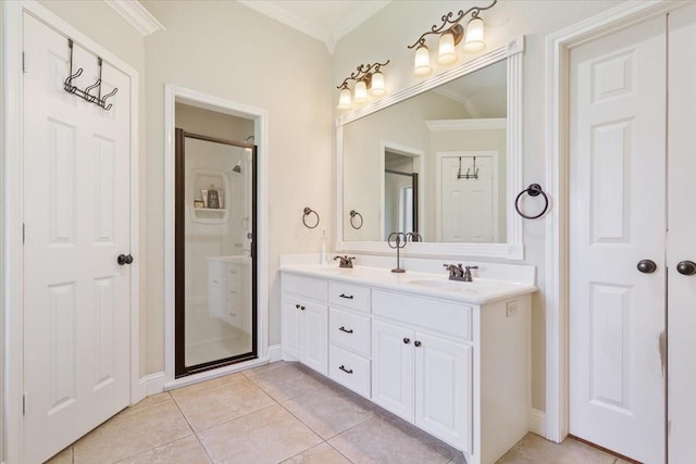 213 Desert Sky Dr, Mcgregor, TX 76657 - bathroom featuring crown molding, a shower stall, double vanity, tile patterned floors, and baseboards