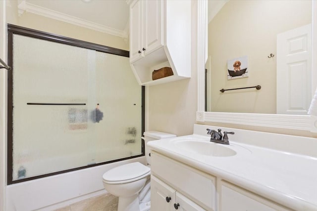 213 Desert Sky Dr, Mcgregor, TX 76657 - full bathroom with ornamental molding, vanity, toilet, enclosed tub / shower combo, and tile patterned floors