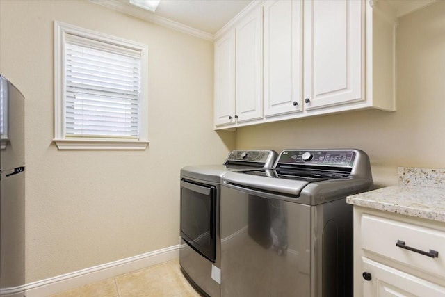213 Desert Sky Dr, Mcgregor, TX 76657 - laundry area featuring cabinet space, washing machine and dryer, baseboards, crown molding, and light tile patterned flooring