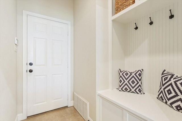 213 Desert Sky Dr, Mcgregor, TX 76657 - mudroom with baseboards and light tile patterned flooring
