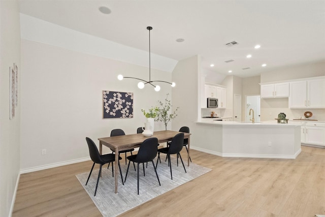 1403 Petersburgh Pl, Allen, TX 75013 - dining area featuring vaulted ceiling, light wood-style floors, baseboards, a chandelier, and recessed lighting
