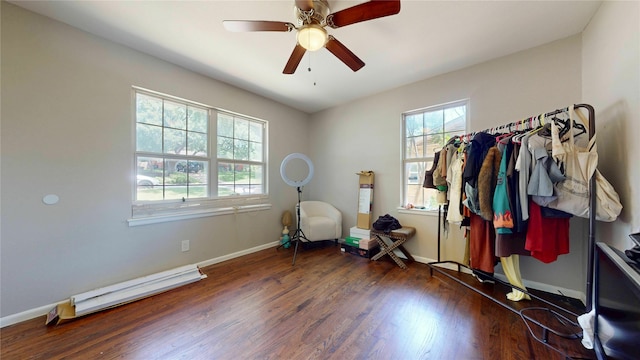1408 Briarwood Blvd, Arlington, TX 76013 - workout area featuring wood finished floors, a baseboard radiator, baseboards, and ceiling fan