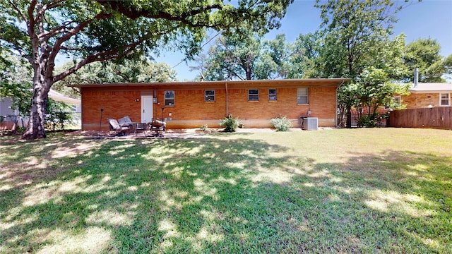 1408 Briarwood Blvd, Arlington, TX 76013 - back of house with brick siding and central AC unit