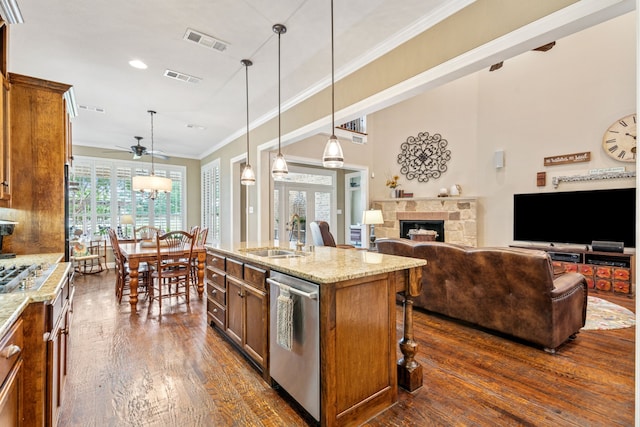 8917 Cypress Creek Rd, Lantana, TX 76226 - kitchen featuring a sink, stainless steel dishwasher, ceiling fan, dark wood-type flooring, and light stone countertops