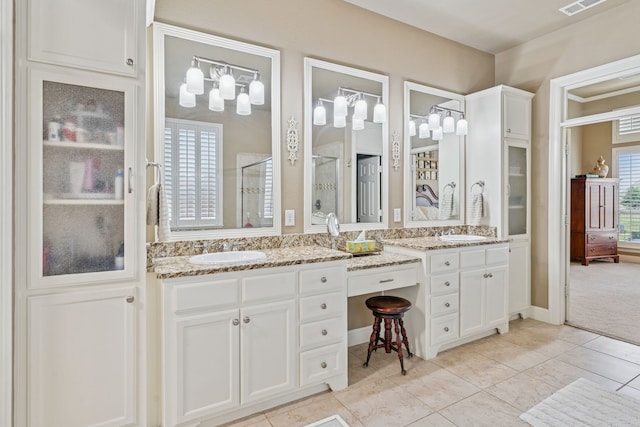 8917 Cypress Creek Rd, Lantana, TX 76226 - bathroom featuring a shower stall, vanity, and tile patterned floors