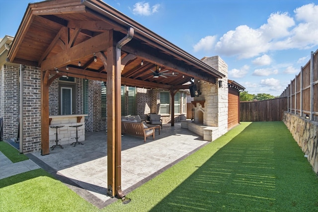 3503 Jersey Rd, Melissa, TX 75454 - view of patio / terrace featuring a ceiling fan and an outdoor living space with a fireplace