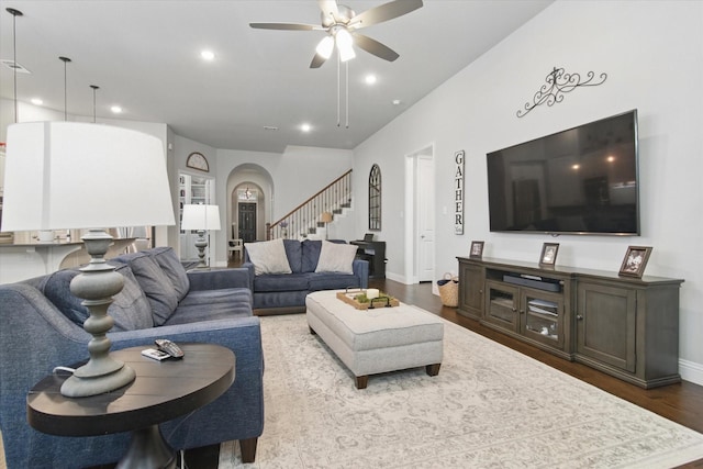 3503 Jersey Rd, Melissa, TX 75454 - living room with stairway, a ceiling fan, recessed lighting, wood finished floors, and arched walkways