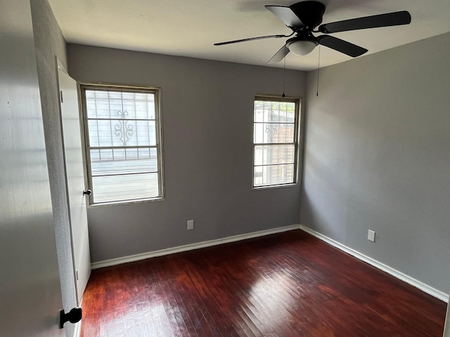 2836 Modree Ave, Dallas, TX 75216 - spare room with wood finished floors, baseboards, and ceiling fan
