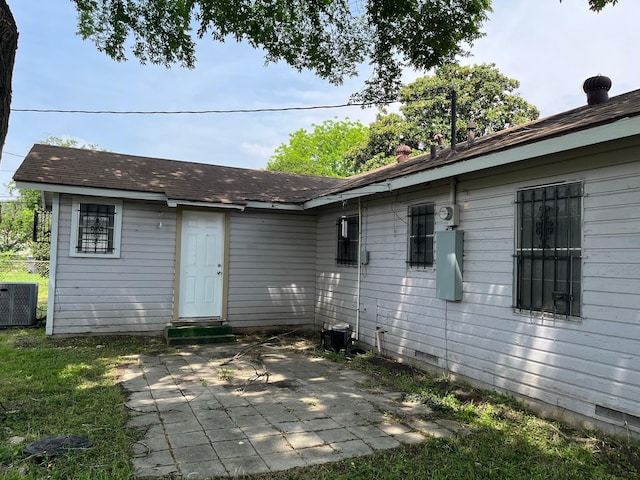 2836 Modree Ave, Dallas, TX 75216 - rear view of property with central air condition unit and a patio area