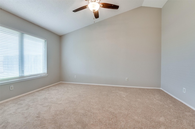 2005 Parkside Dr, Denton, TX 76201 - unfurnished room featuring vaulted ceiling, ceiling fan, carpet, and baseboards