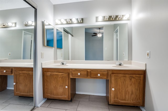 2005 Parkside Dr, Denton, TX 76201 - bathroom with tile patterned flooring, double vanity, and ceiling fan