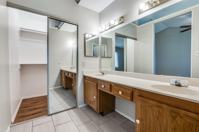 2005 Parkside Dr, Denton, TX 76201 - bathroom with double vanity and baseboards