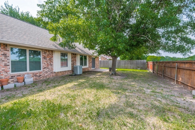 2005 Parkside Dr, Denton, TX 76201 - view of yard with central AC unit